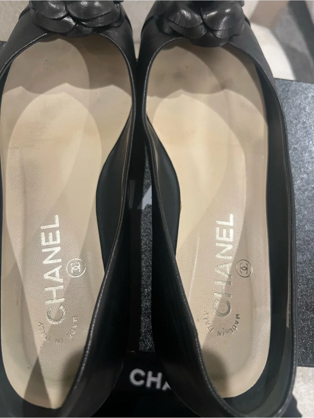CHANEL Black Leather Camellia Round-Toe Flats